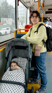 Family exploring Taichung by bus after train arrival
