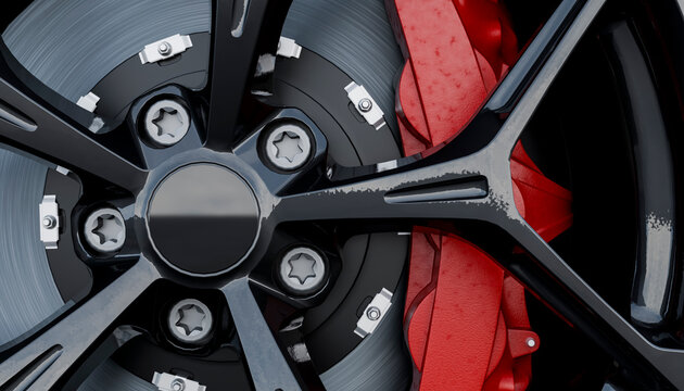 Close-up of black alloy wheel with red brake caliper