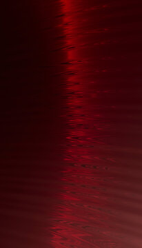 Abstract red brushed metal texture background with dark gradient