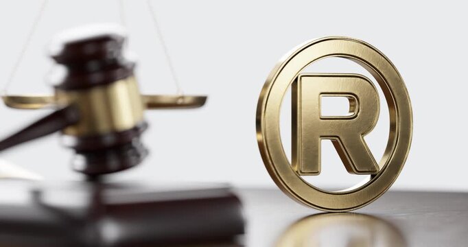 R trademark registred symbol and Gavel. Business Intellectual Property Concept