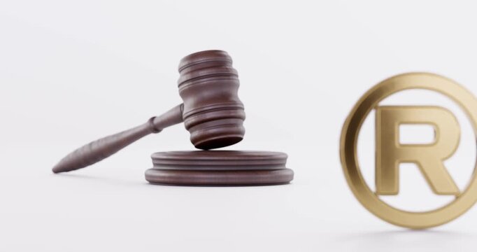 R trademark registred symbol and Gavel. Business Intellectual Property Concept