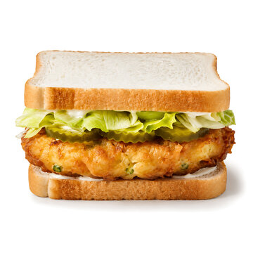%40 St. Paul sandwich  crispy egg foo young patty inside white bread with lettuce  pickles  mayo