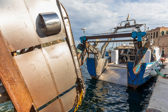 Fishing boat gear and metal propeller in Calpe harbor