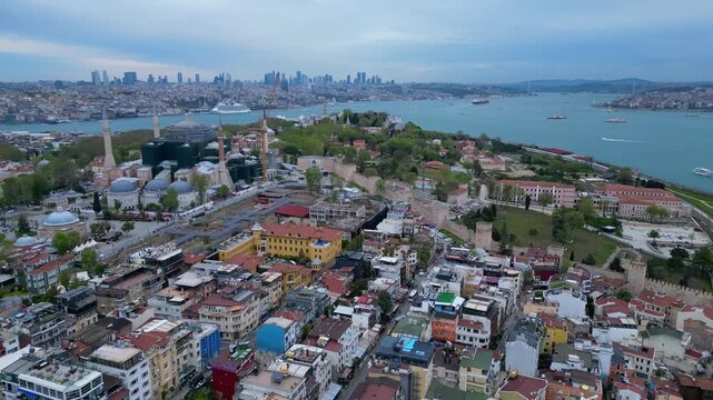 Istanbul cityscape with Hagia Sophia overlooking Bosphorus. Magic aerial view drone