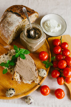 Rustic artisan bread with pate, cream cheese, quail egg