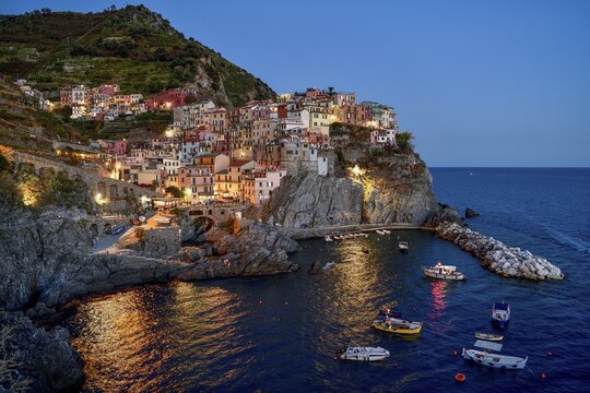 Fishing village of Manarola, blue hour, blue hour, district of Riomaggiore, Cinque Terre, province of La Spezia, Liguria, Italy