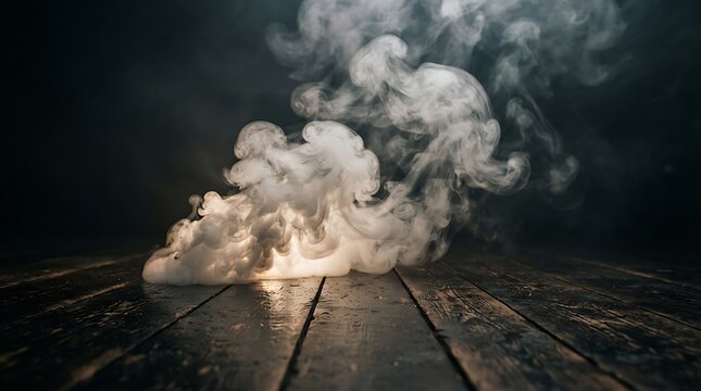 Dramatic white smoke rising from a wooden surface against a dark background creating a mysterious and atmospheric scene