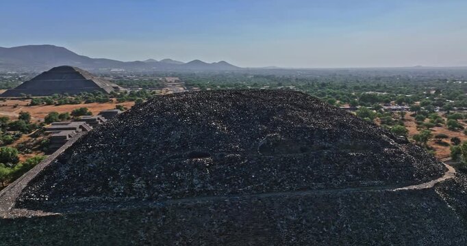 Teotihuacan Mexico Aerial v5 circular pan drone flying close and around the top of pyramid of the moon capturing the magnificent and marvellous stone structure - Shot with Mavic 3 Cine - December 2021