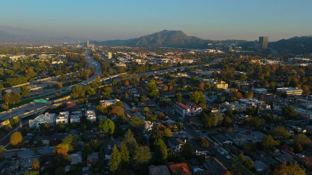 Aerial Golden Hour Drone Flight Above Studio City Toward Universal City California