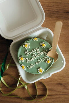 Bento cake with birthday message in takeout box