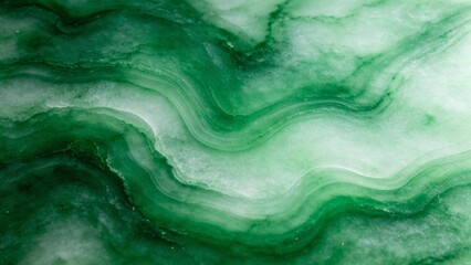 Polished nephrite jade surface with translucent green veining patterns © 智勤 何