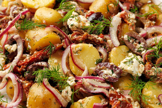 Greek Potato Salad with Feta Cheese, Kalamata Olives, Sun Dried Tomatoes and Red Onion