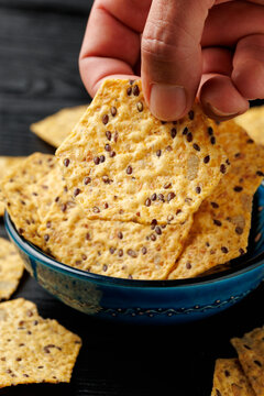 Seeded Tortilla Crackers in a Blue Bowl