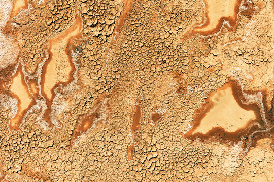 Fine art aerial texture of magical water in dried earth