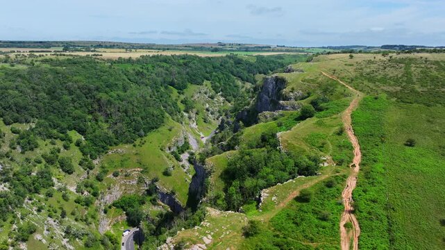 Tracking aerial shot revealing Cheddar Gorge, Somerset, UK