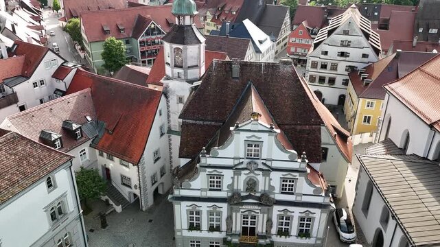 Wangen im Allg&auml;u Town Hall Rathaus and library aerial flight. Drone flight from the historic Town Hall Rathaus towards the Argen river and library in the morning.