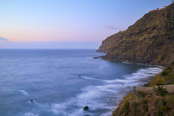 El Ancon Beach, with its black sand, large rocks, and the Atlantic Ocean, in Tenerife, Spain long exposure at sunset © Ovidiu
