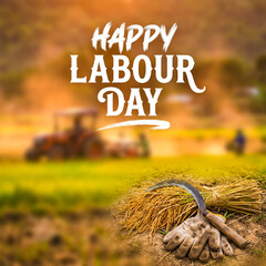 Happy labour day concept with farming tools, wheat bundle, and gloves on soil in a rural field