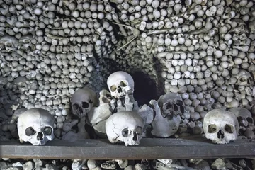 Kostnice Church in Kutna Hora with Ossuary interior decoration from human bones and skulls, Czech republic, in black-and-white color © rustamank