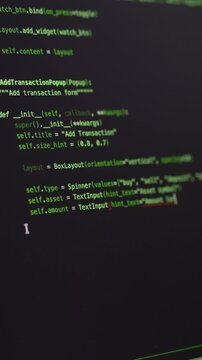 Green source code fills computer screen during vibe coding session with AI assistant. Modern programming workflow, software engineering, automation and artificial intelligence concept.