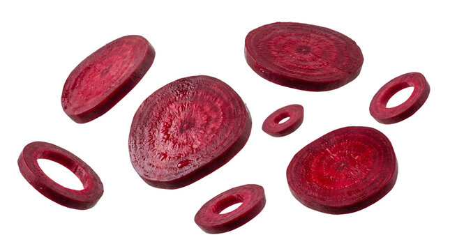Group of Flying Red Beetroot Slices and Rings Isolated on White, Raw Organic Vegetable for Healthy Salad and Cooking