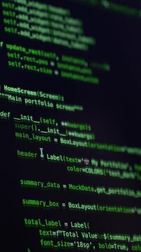 Vibe coding session with AI assistant visible on screen displaying green source code. Programming workflow reflects automation, digital innovation and modern software development process.