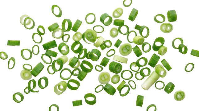 Freshly Sliced Green Onion Rings Scattered on White Background Organic Scallion Garnish for Cooking and Food Seasoning