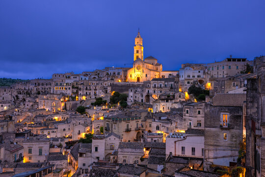 Beautiful night view of Matera Italy with historic ancient architecture 