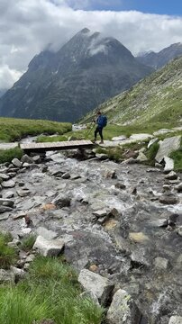 Hiking to Olpererh&uuml;tte in Austria with mountain views and stream crossings