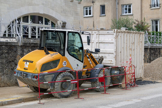 Nancy, France - October 5th 2020 : View on a yellow wheel loader Liebherr L 508 Compact for earthworks on a construction site.