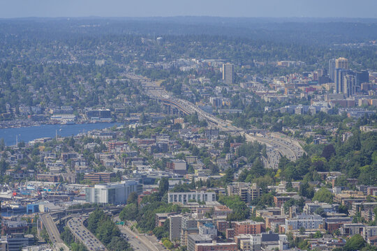 Aerial view of Seattle cityscape with highway and water