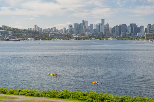 Kayakers on Lake Washington with Seattle skyline background