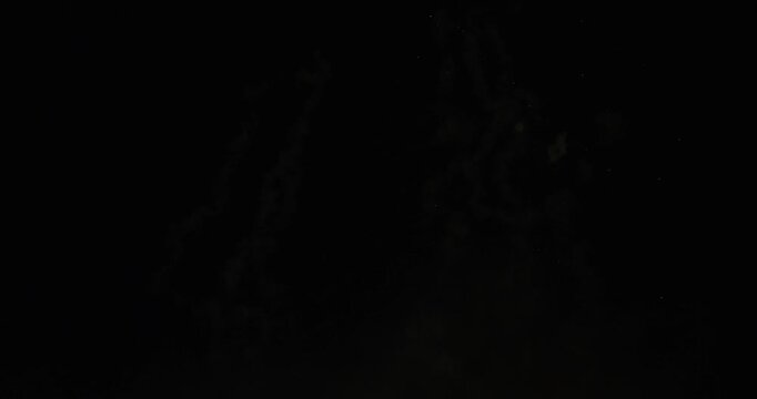 Majestic, colorful fireworks exploding on dark backdrop
