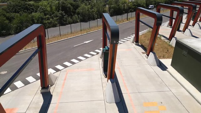 Malataverne, France - July 6, 2026: Aerial drone view of the Milence electric truck charging hub with ultra-fast charging bays for heavy-duty electric vehicles on the A7 motorway in Southern France