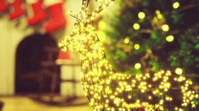 Mantle with glowing reindeer and stockings, warm fireplace blur, decorated tree peeking in background, stacked presents and soft golden lights create festive