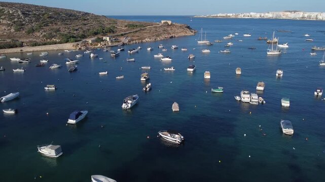 Malta, Mstra Bay, aerial view of Mistra Battery built by the Order of Saint John in 18th Century. Coastal fortification. Establishing shot. High quality 4k footage