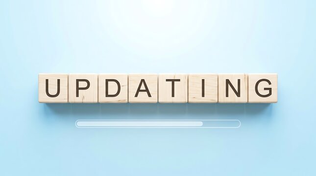Wooden blocks spelling updating with a digital progress loading bar on light blue background