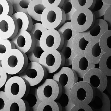 Light grey matte plastic number eight pattern background close up