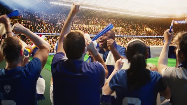Passionate football fan shouts through megaphone in stadium, leading crowd during match for fan culture, stadium atmosphere and team support content.