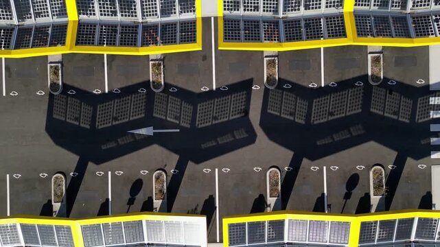 Saulce-sur-Rhone, France - June 26, 2026: Aerial drone view of Fastned electric vehicle charging station with solar canopies along the A7 motorway in Southern France, showcasing modern EV fast chargin