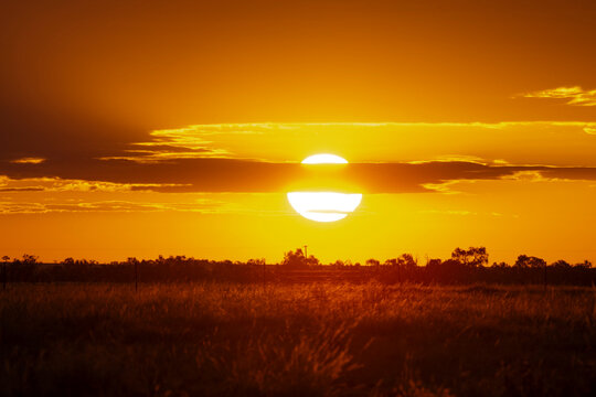 Red outback sunset in Queensland, Australia.