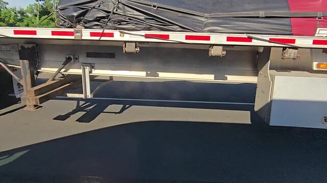 Highway Traffic View Out The Window of a Moving Vehicle Featuring Cars and Trucks 4k B-Roll