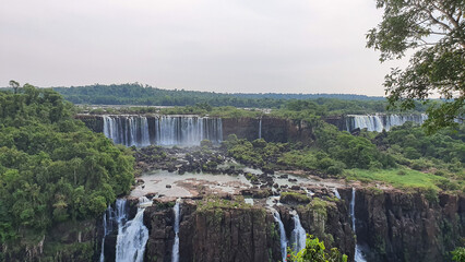 Panoramic view of Iguazu Falls cascades and jungle landscape. © Eze