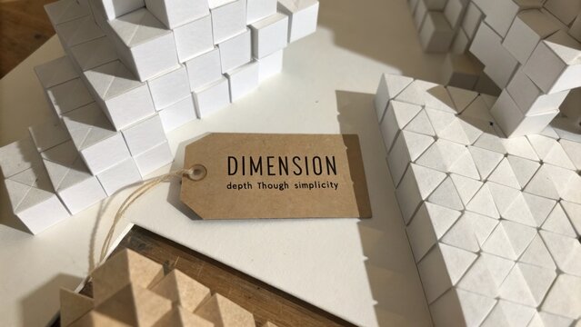 White geometric shapes and textures showcasing depth and simplicity with a labeled tag named 'DIMENSION' in a creative layout