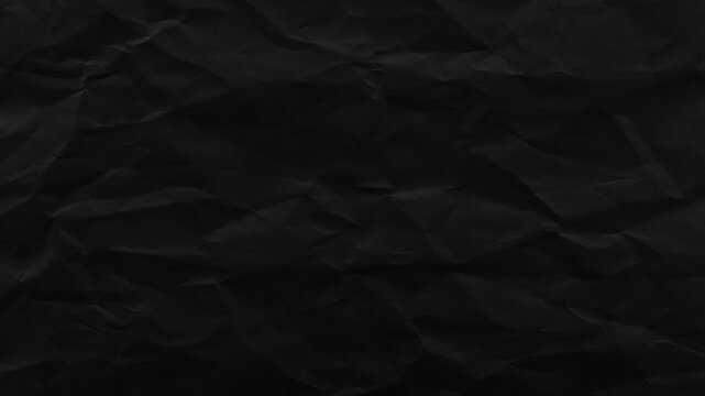 Black crumpled paper background texture. Stop motion animation