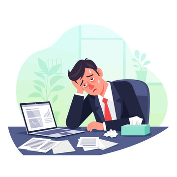 Stressed Businessman Feeling Overwhelmed At His Desk With Laptop
