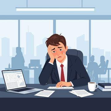 Stressed Businessman Overwhelmed By Work And Deadlines In Modern Office Setting