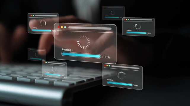 Hands Typing on Keyboard with Progress Loading Bars Displayed on Screen, Symbolizing Data Processing and Digital Technology Gluon.