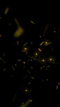 Magical luminous yellow sparks or fireflies flying towards camera in seamless loop, vertical format
