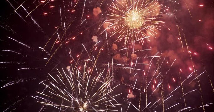 Multiple Gold and White Firework Bursts Filling Night Sky In Provo Utah